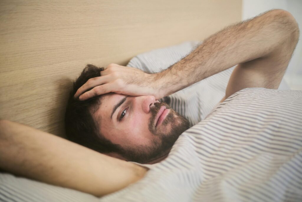 A man wakes up feeling exhausted